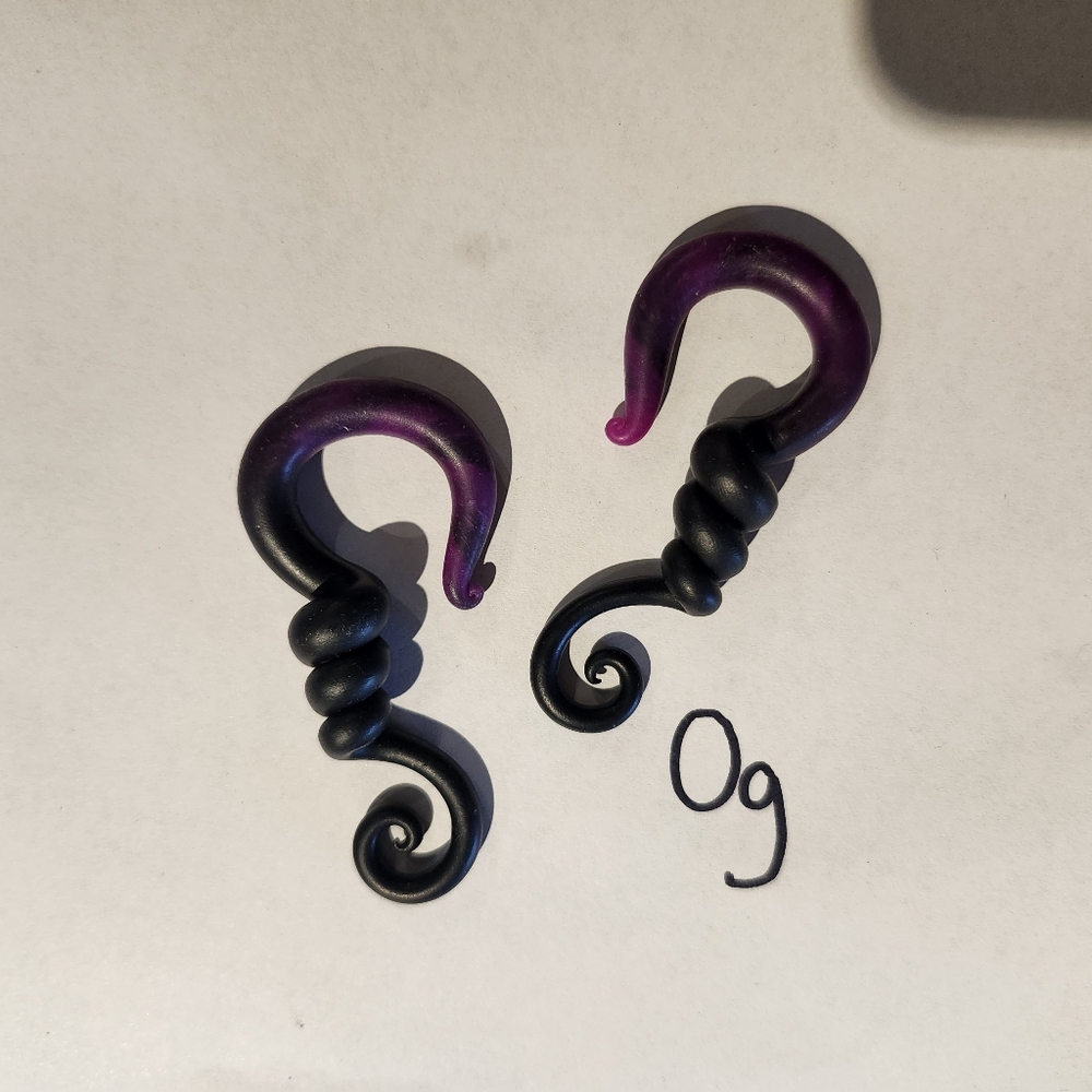 Purple and Black Spiral Gauges